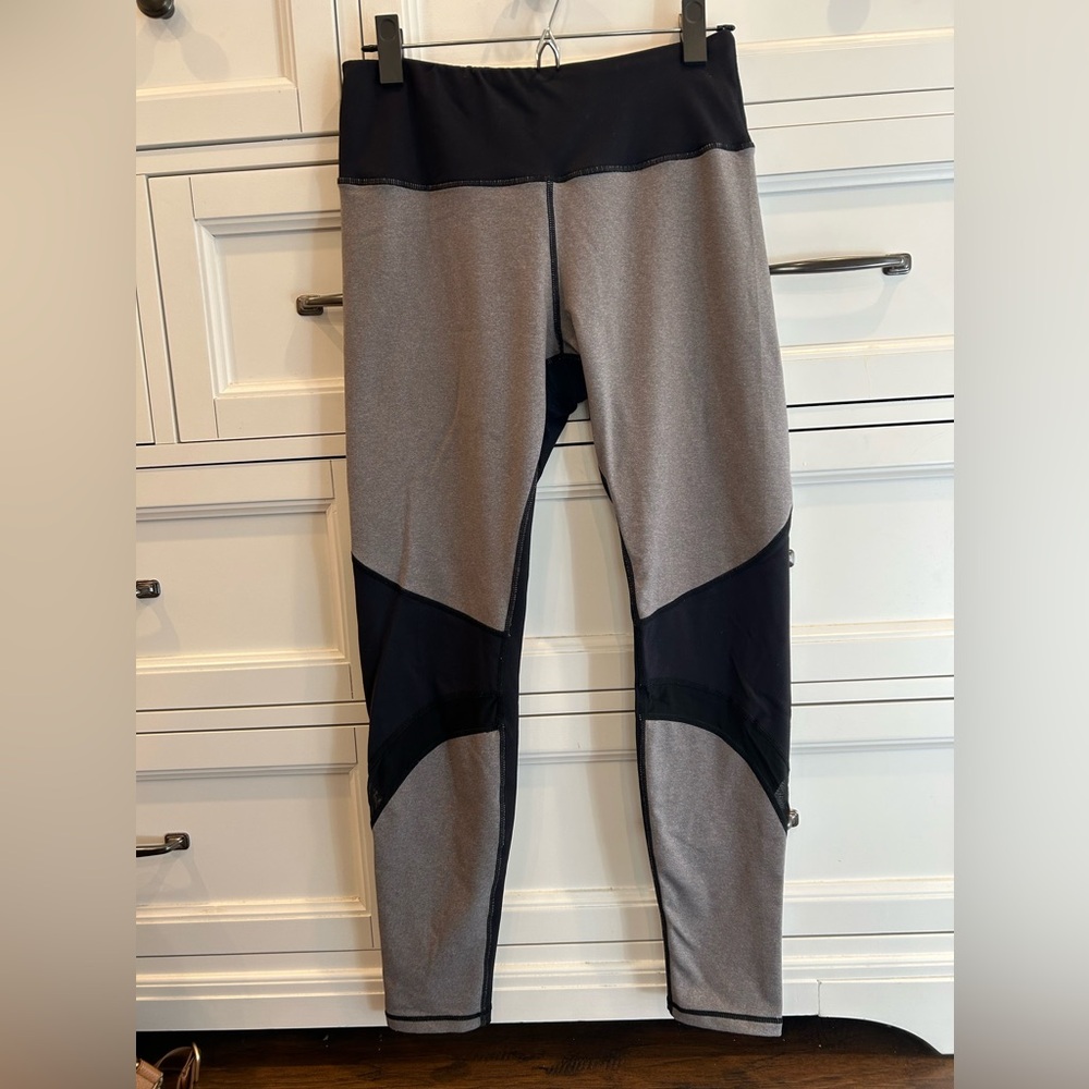 Senita Athletics black and gray activewear leggings with mesh cutouts size L